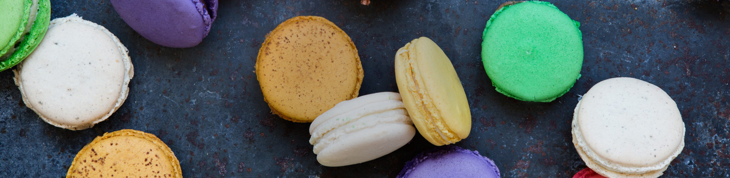 Close up assortment of colorful macaron cookies